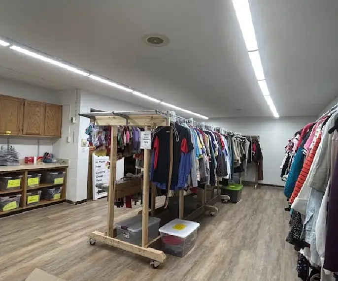 Racks of clothing ready to be donated to individuals in need, part of St. Paul's Clothing Closet